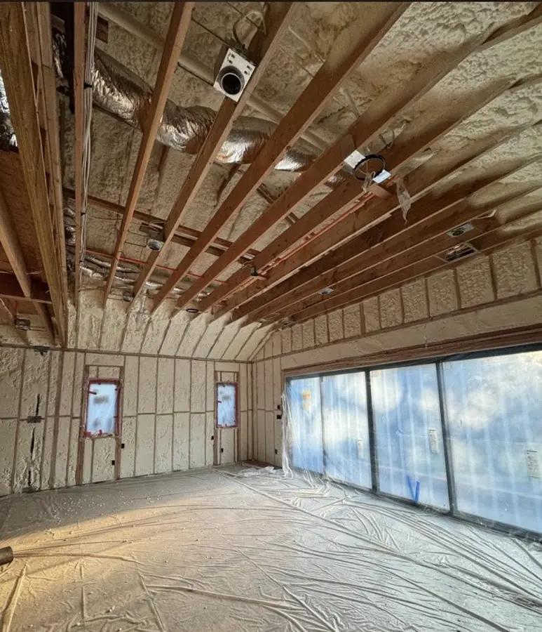 Interior walls and ceiling insulated with spray foam during new construction in Roanoke